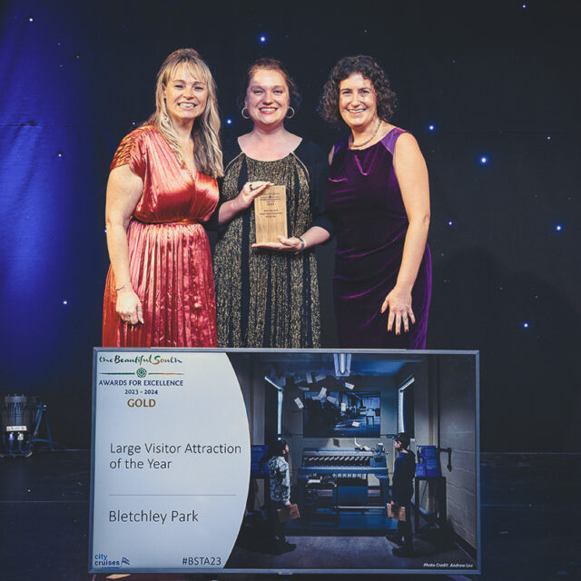 The Beautiful South Gold Award for Large Visitor Attraction is collected on behalf of Bletchey Park by Erica Monro, Head of Content, and Melanie Owen, Marketing Manager.